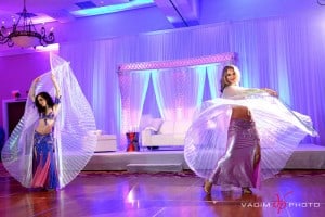 Carrara performs belly dance with Vanja at an Indian wedding in Tampa