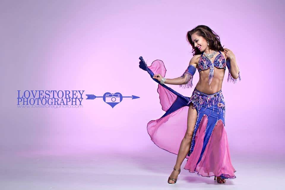 Orlando belly dancer Carrara Nour models in a photo shoot with wedding photographer Mandy Austin of LoveStorey Photography, with low-level fog (dancing on a cloud) by Rhythm of the Night Entertainment, and Digital Tiger Studios in Orlando
