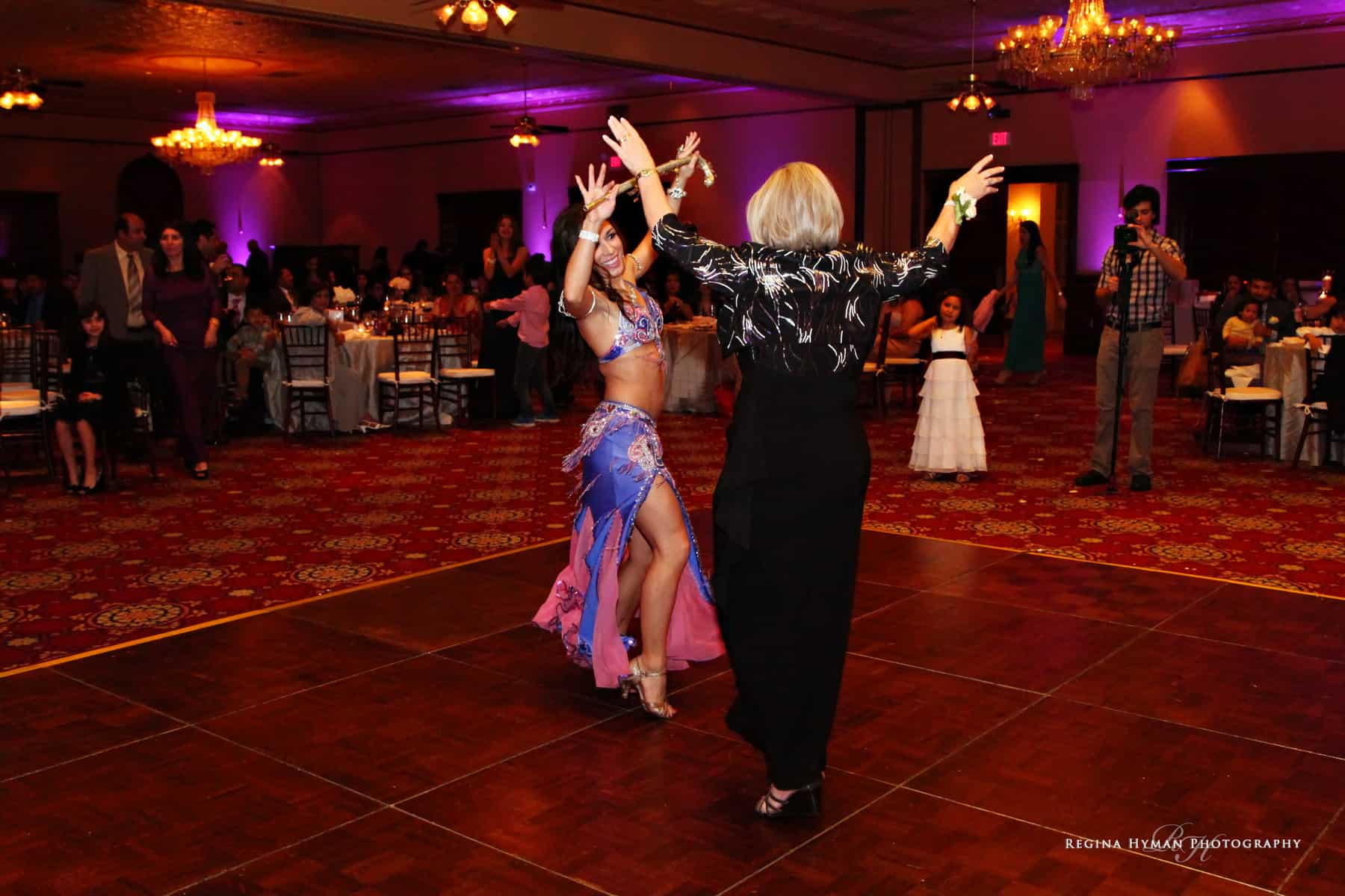 Orlando wedding belly dancer Carrara Nour performs an Egyptian cane dance at the Ballroom at Church Street in Orlando