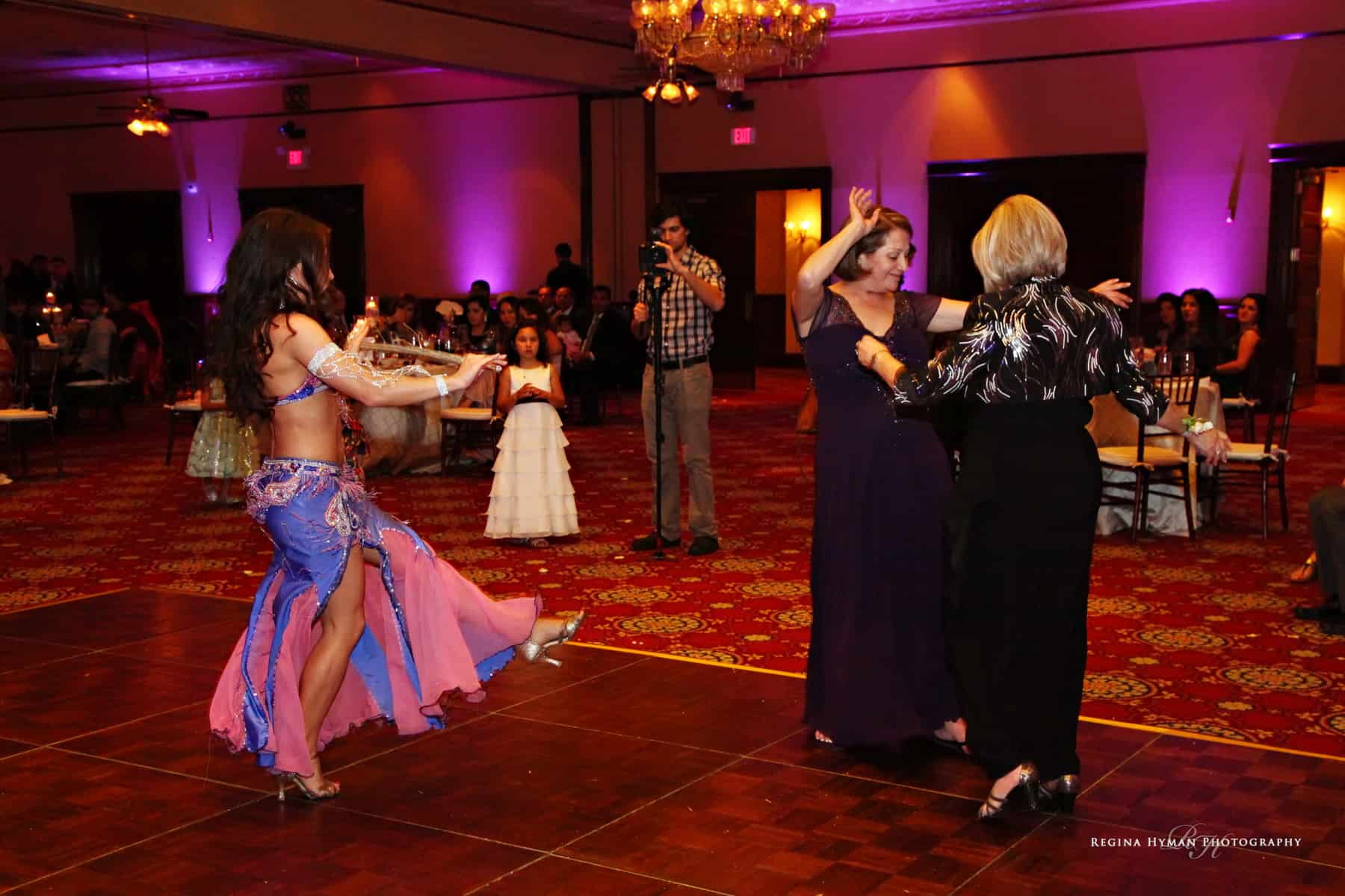 Belly Dancer Carrara Nour performs a cane dance at an Arabic Wedding in Florida