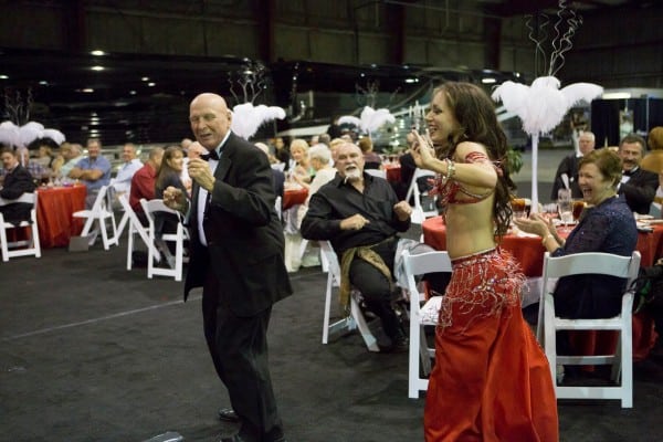 Belly dancer Carrara Nour teaches guests some new moves at a corporate event in Orlando