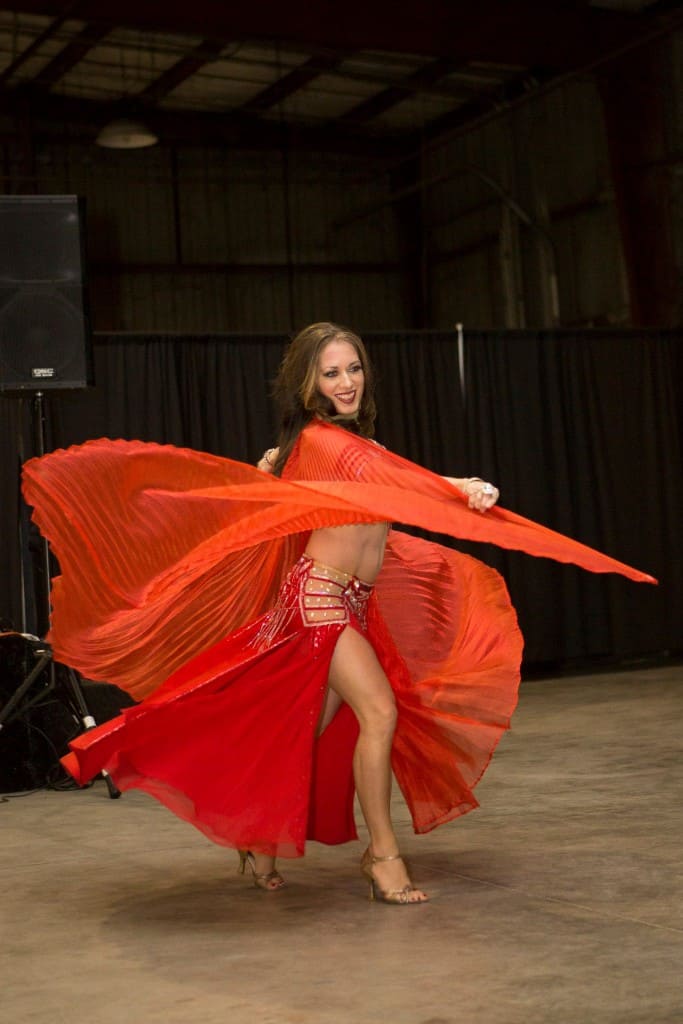 Carrara Nour performs with Isis wings at a corporate party in Orlando, FL